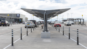 Bristol Airport taxi dropping passengers at the terminal